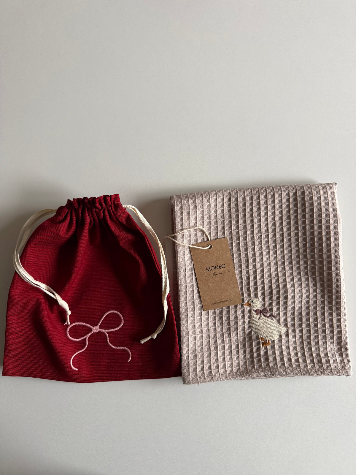 TOWEL WITH DUCK + RED BAG